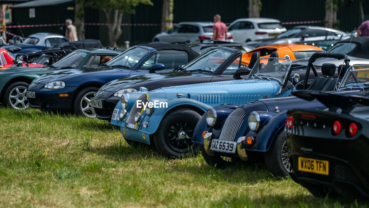 CAR PARKED ON FIELD