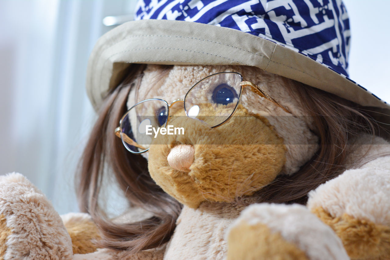 stuffed toy, toy, teddy bear, childhood, representation, animal representation, plush, child, close-up, indoors, cute, hat, portrait