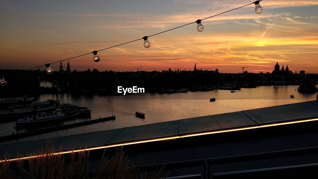 River against sky during sunset