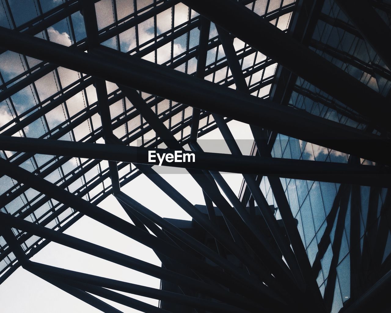 Low angle view of glass ceiling of building