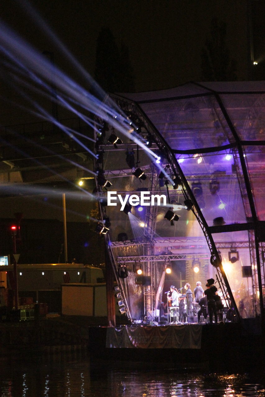 Musical performers on stage at music concert