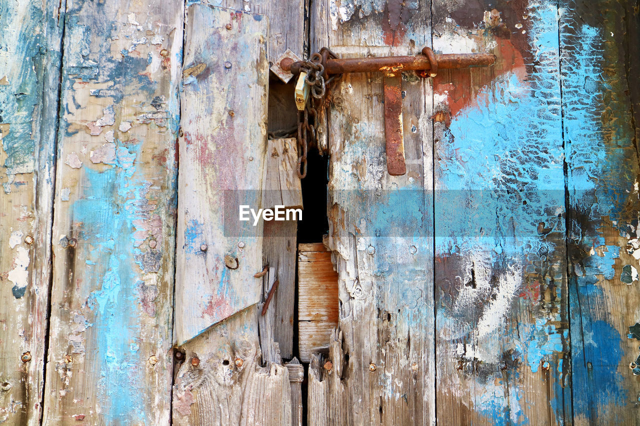 Close-up of old weathered wooden door