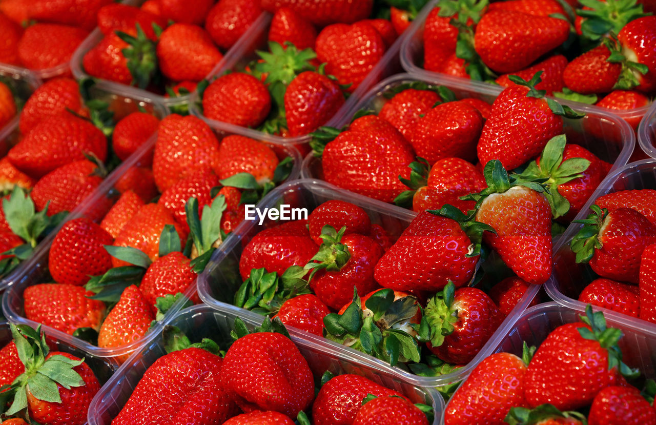 Full frame shot of strawberries for sale at market