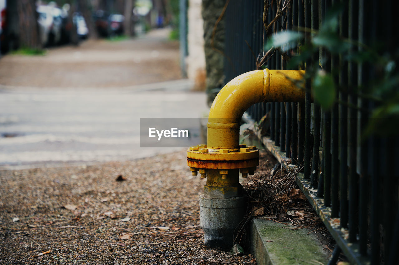 Pipeline Abandoned Architecture City Close-up Day Drainage Fire Hydrant Focus On Foreground Footpath In A Row Metal Nature No People Outdoors Pipe Pipe - Tube Protection Rusty Screw Security Selective Focus Street Wheel Yellow