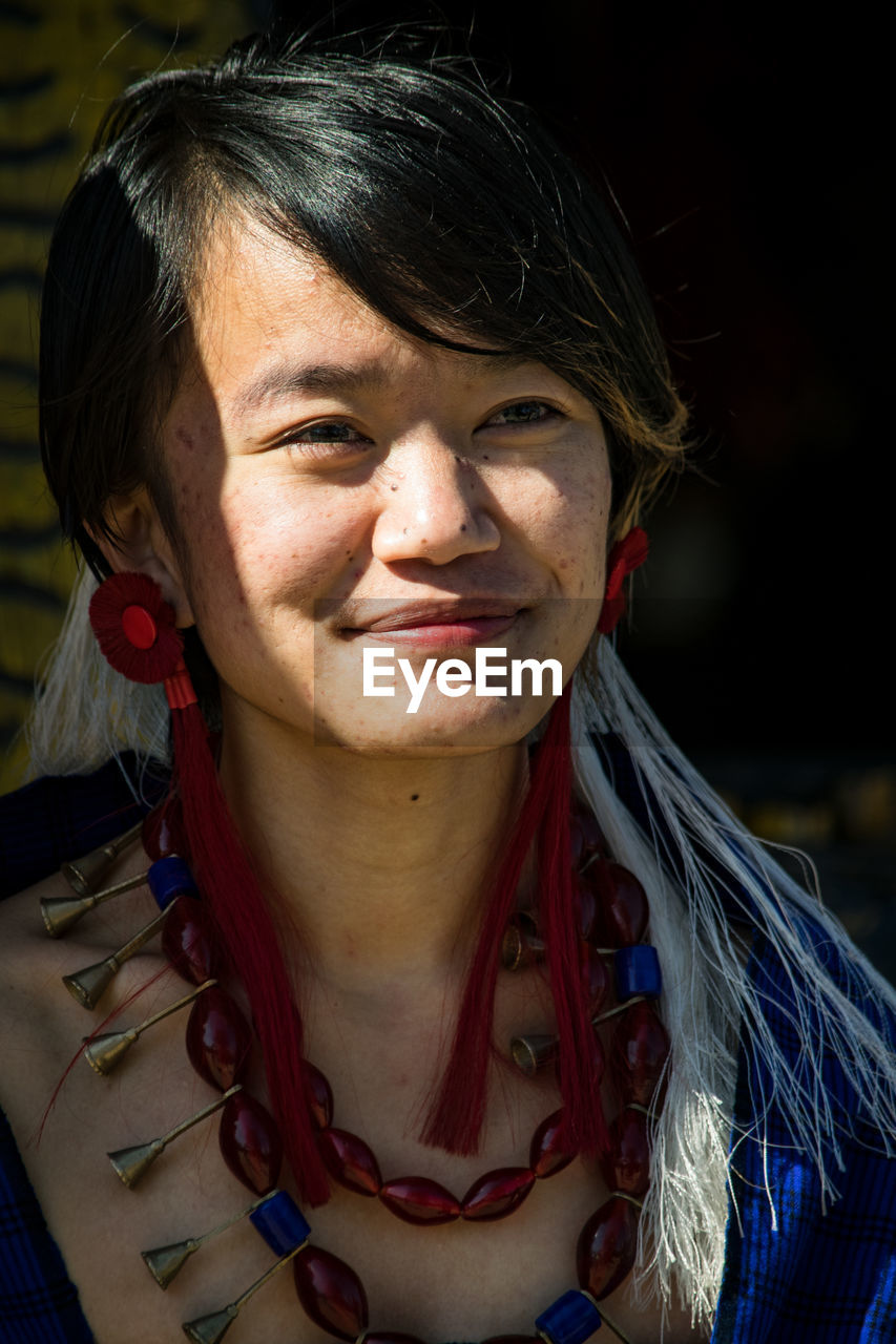 CLOSE-UP PORTRAIT OF WOMAN WITH FACE