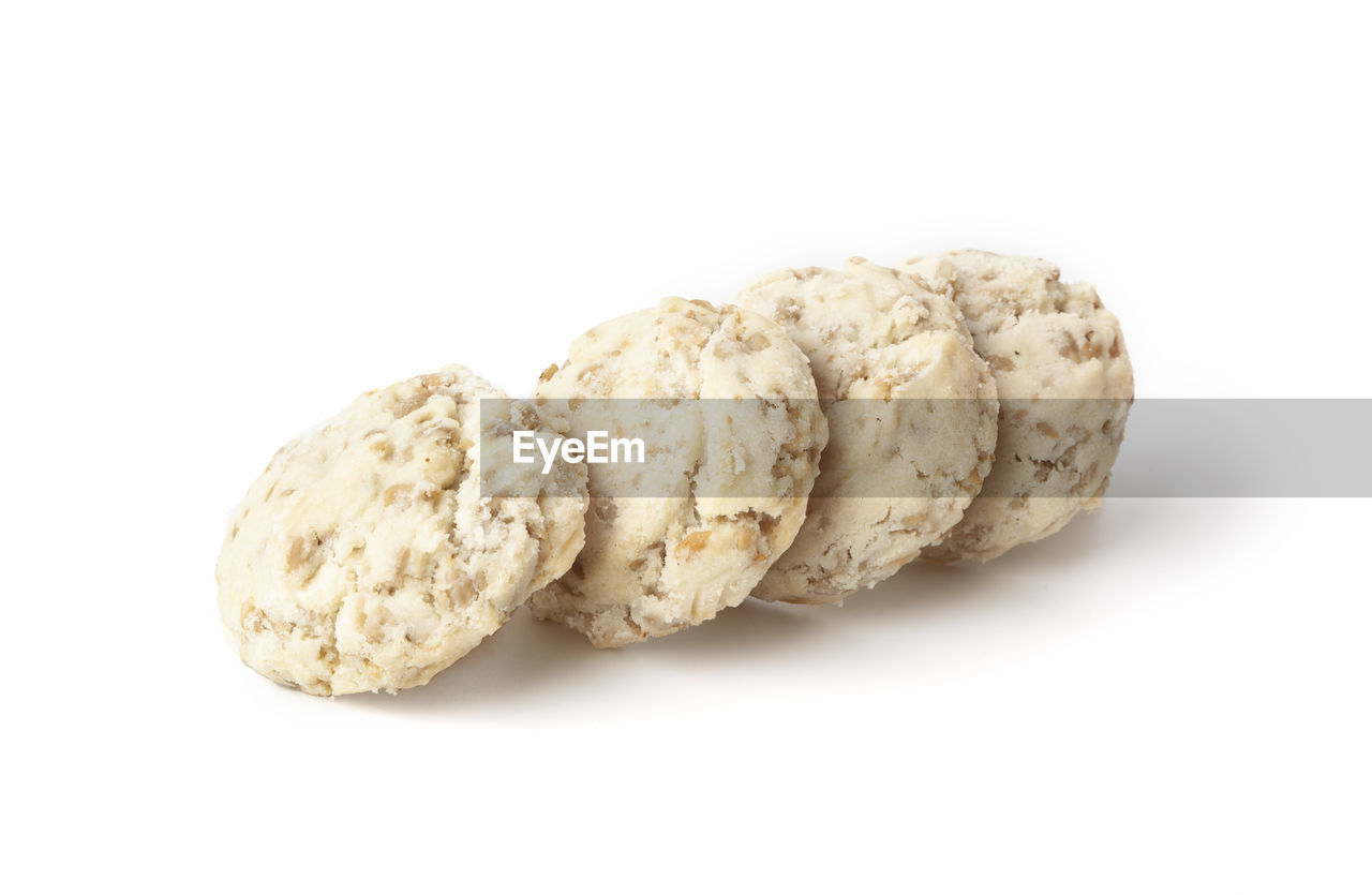 Close-up of cookies against white background