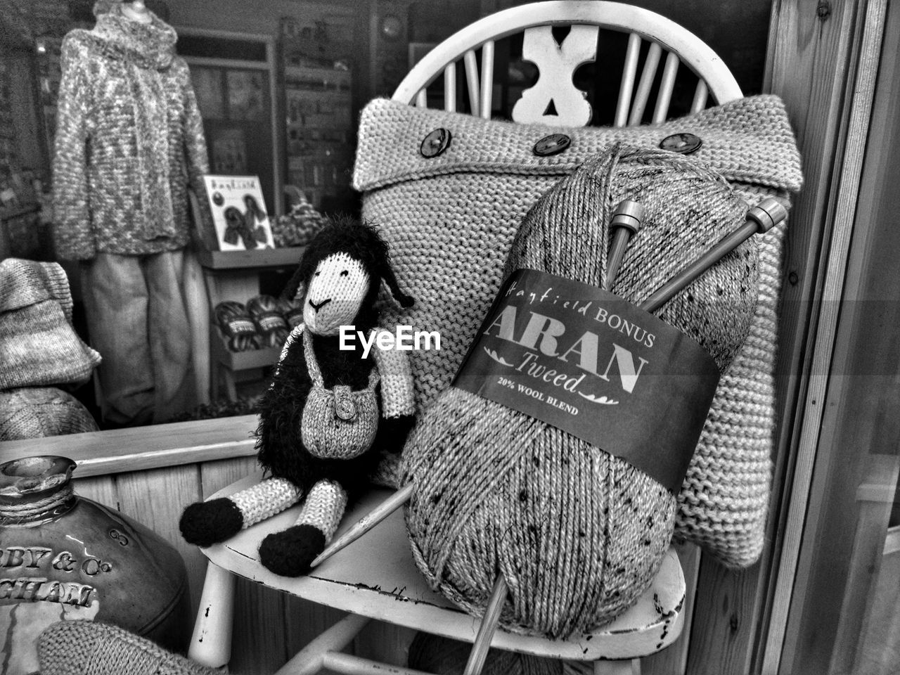 CLOSE-UP OF STUFFED TOY ON SHELF