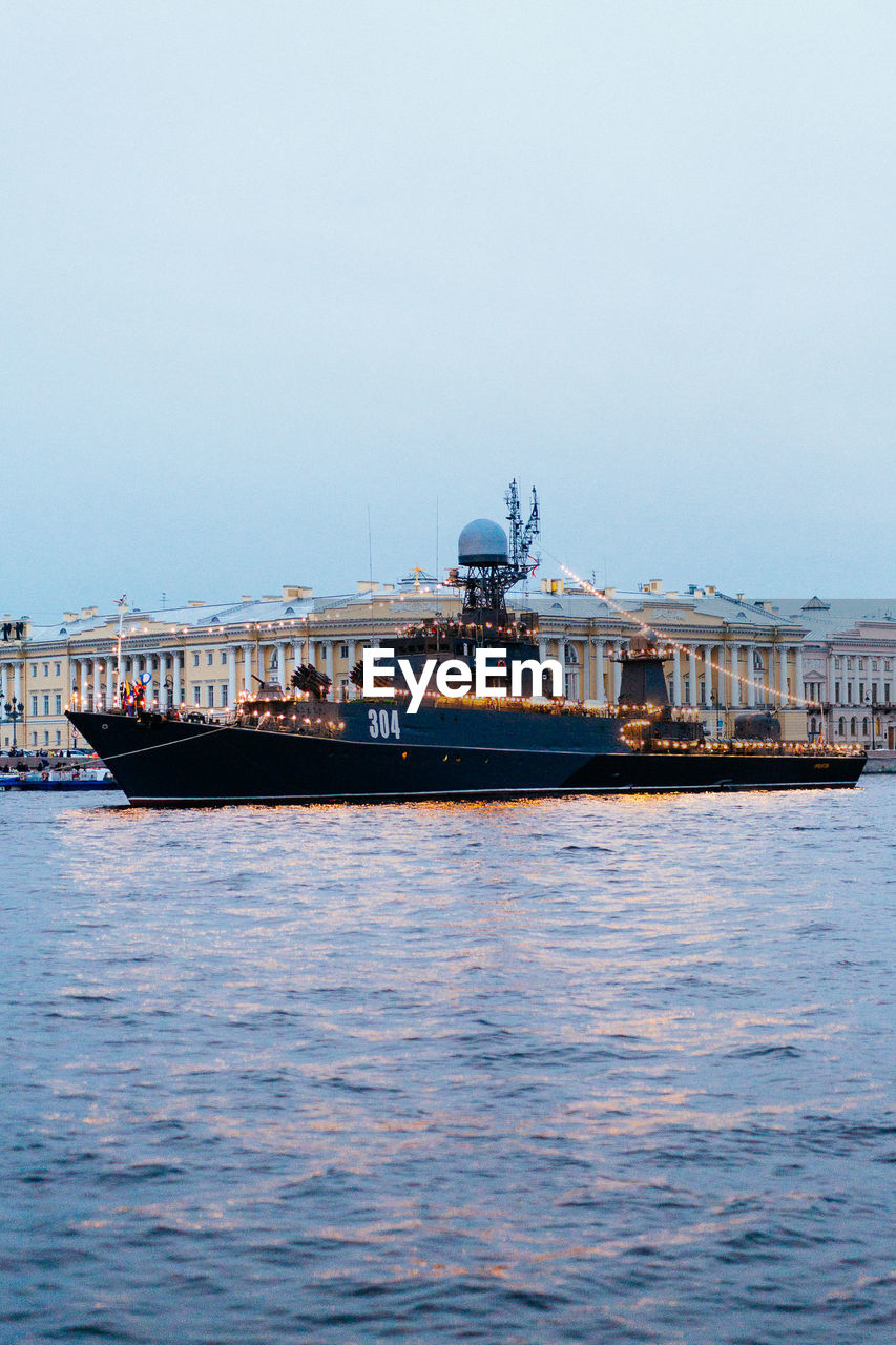 SHIP IN SEA AGAINST CLEAR SKY