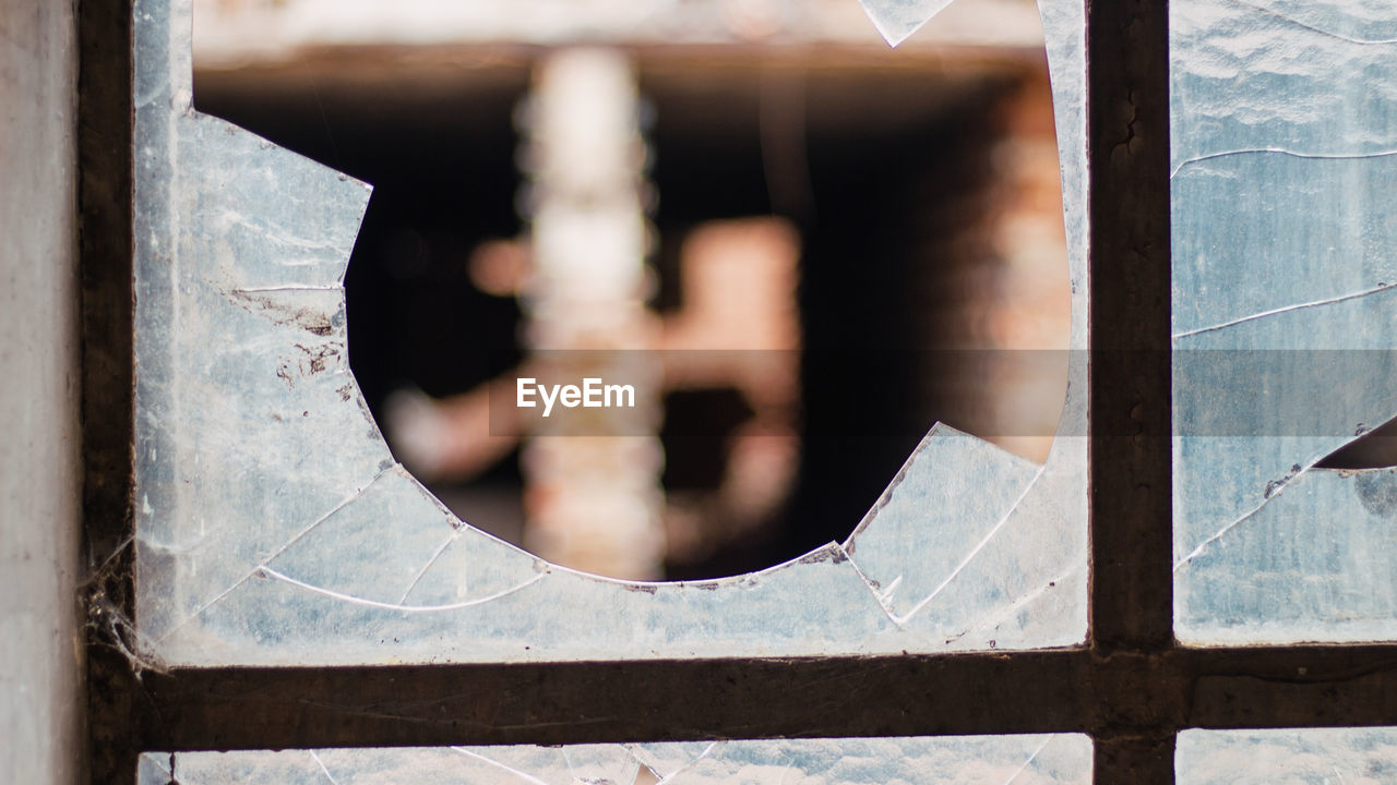 Close-up of rusty metal window