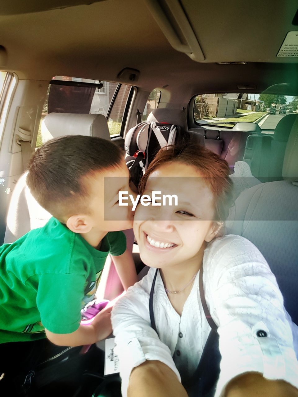 WOMEN SITTING IN CAR