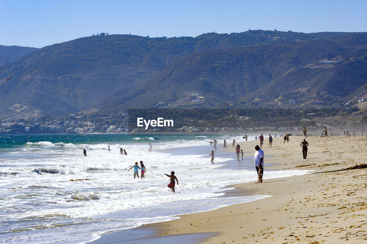 People enjoying the beach at santa monica, california