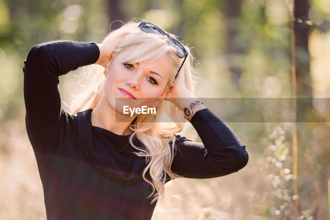 Portrait of young woman outdoors