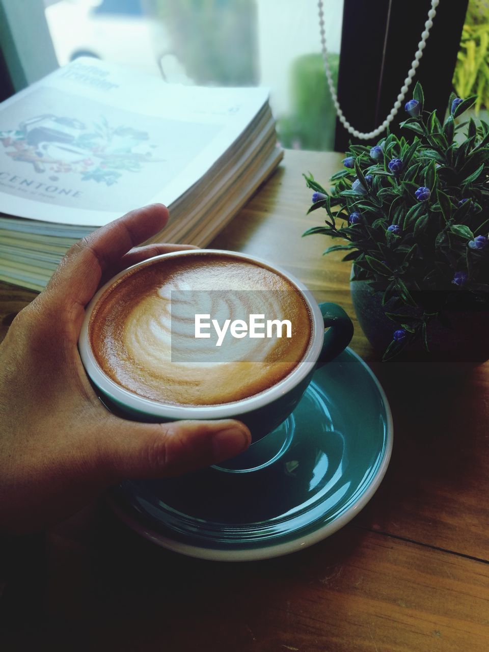 Coffee cup on table