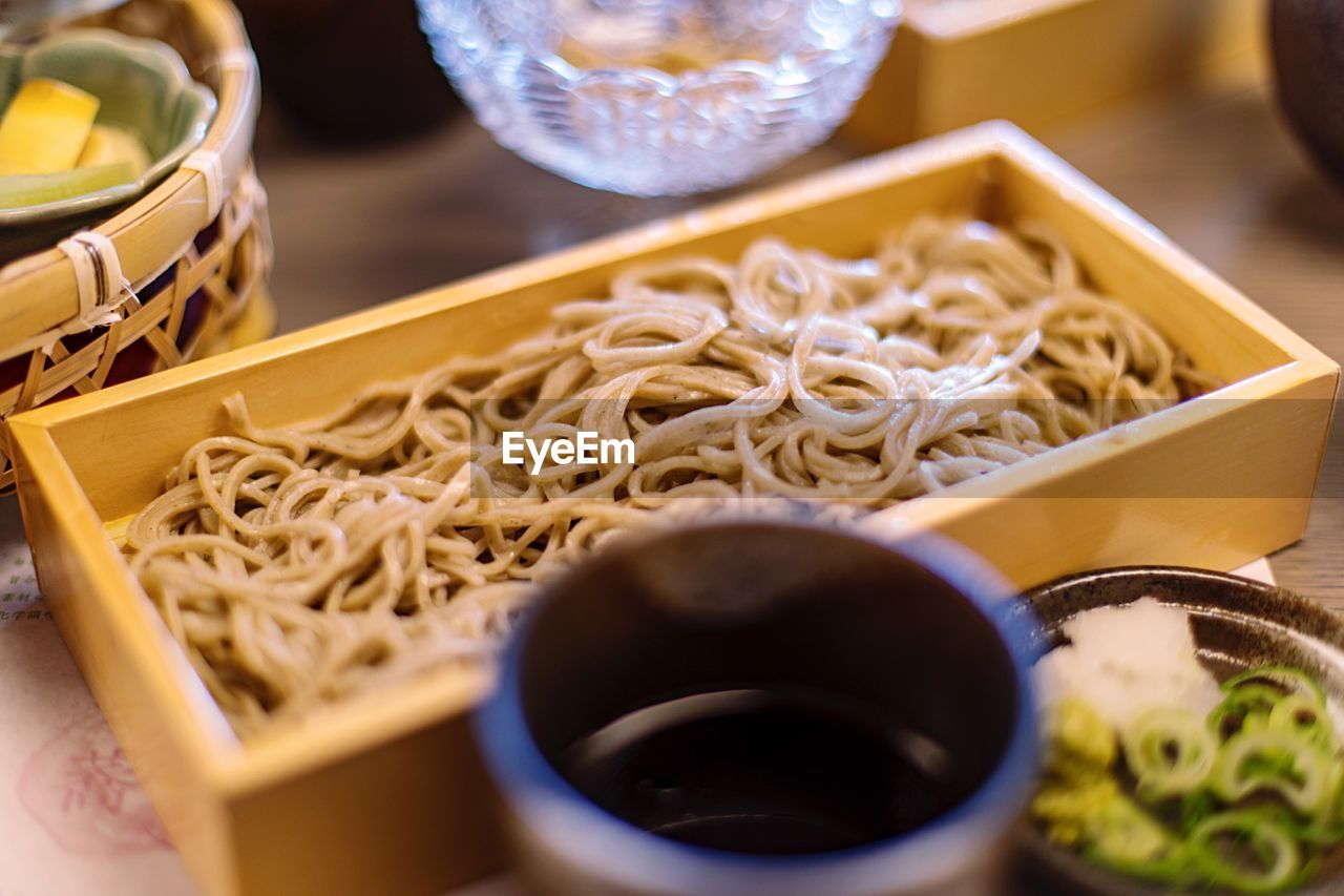 Close-up of noodles in bowl on table