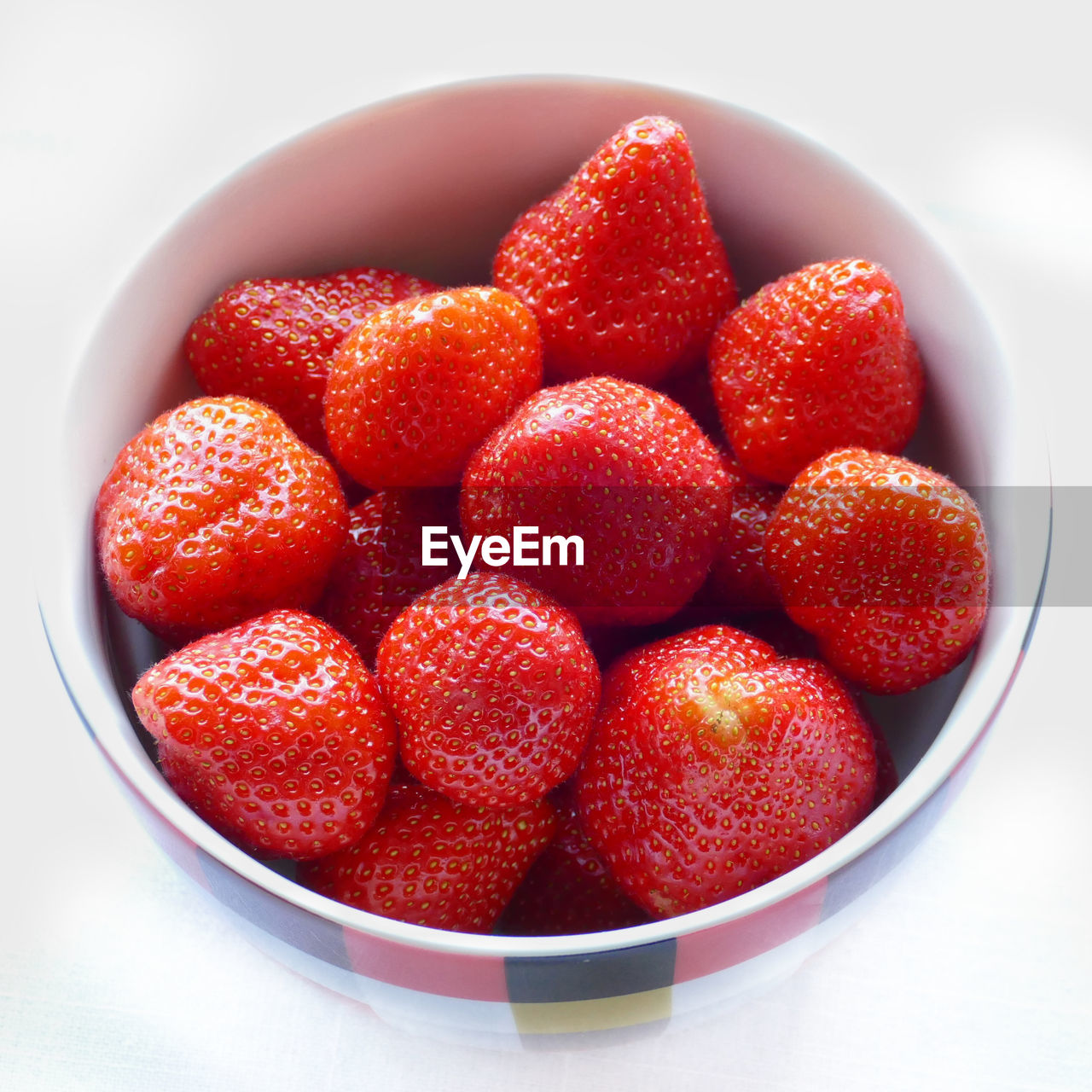 High angle view of strawberries in bowl