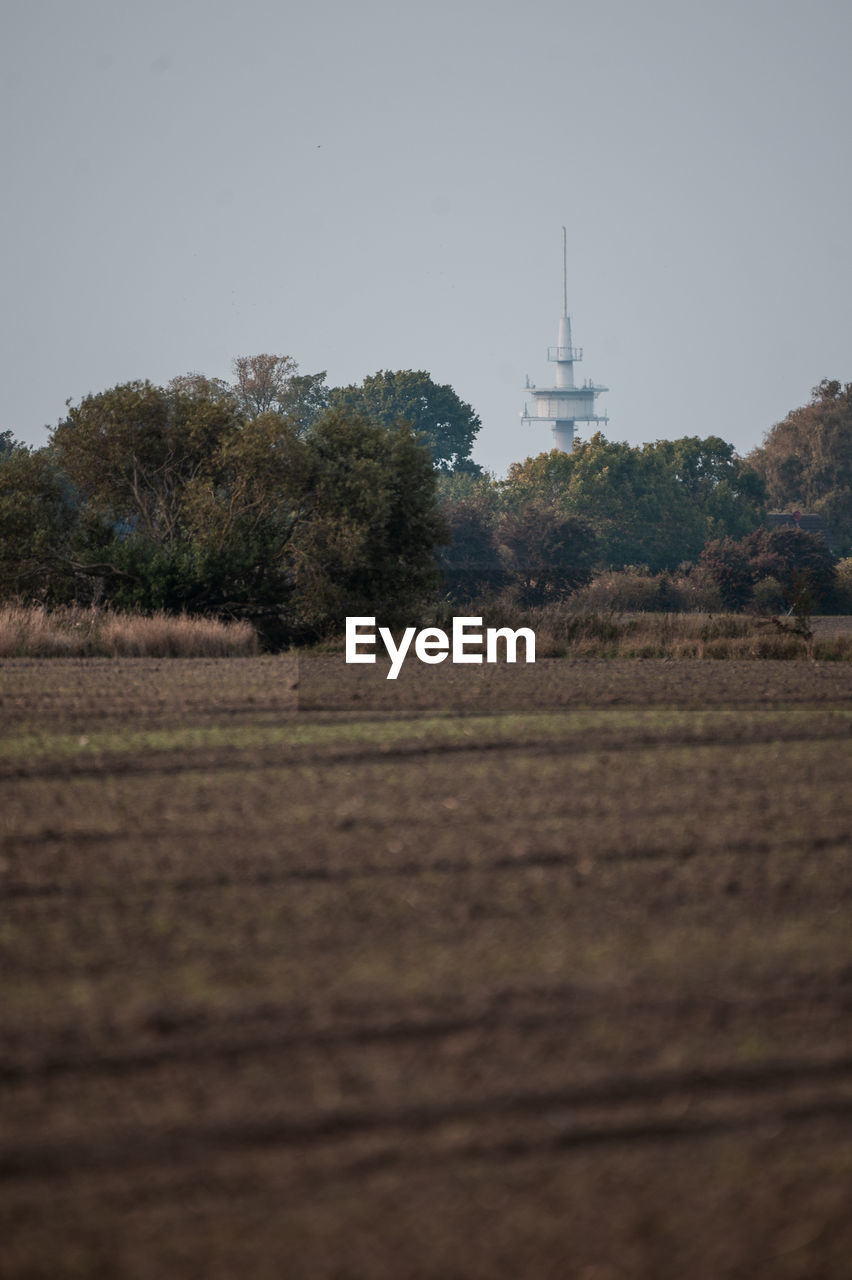 scenic view of agricultural field against clear sky