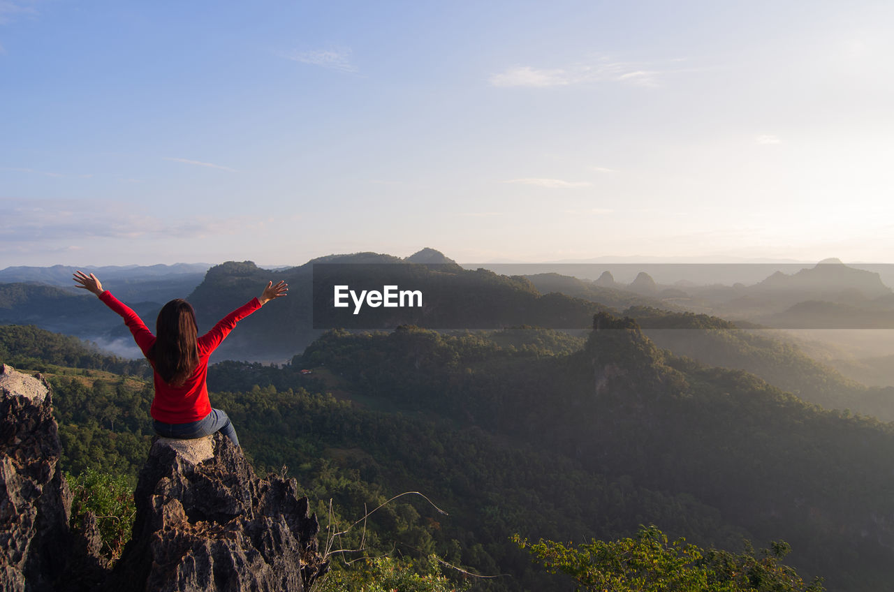 Women is hike on a clear day. mountain climbing, rock climbing. ban jabo, mae hong son, thailand