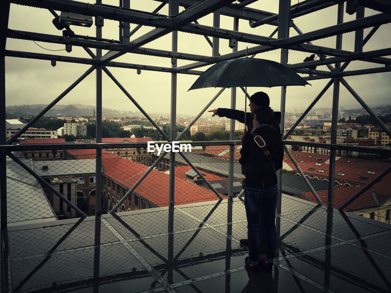 VIEW OF CITYSCAPE WITH UMBRELLA