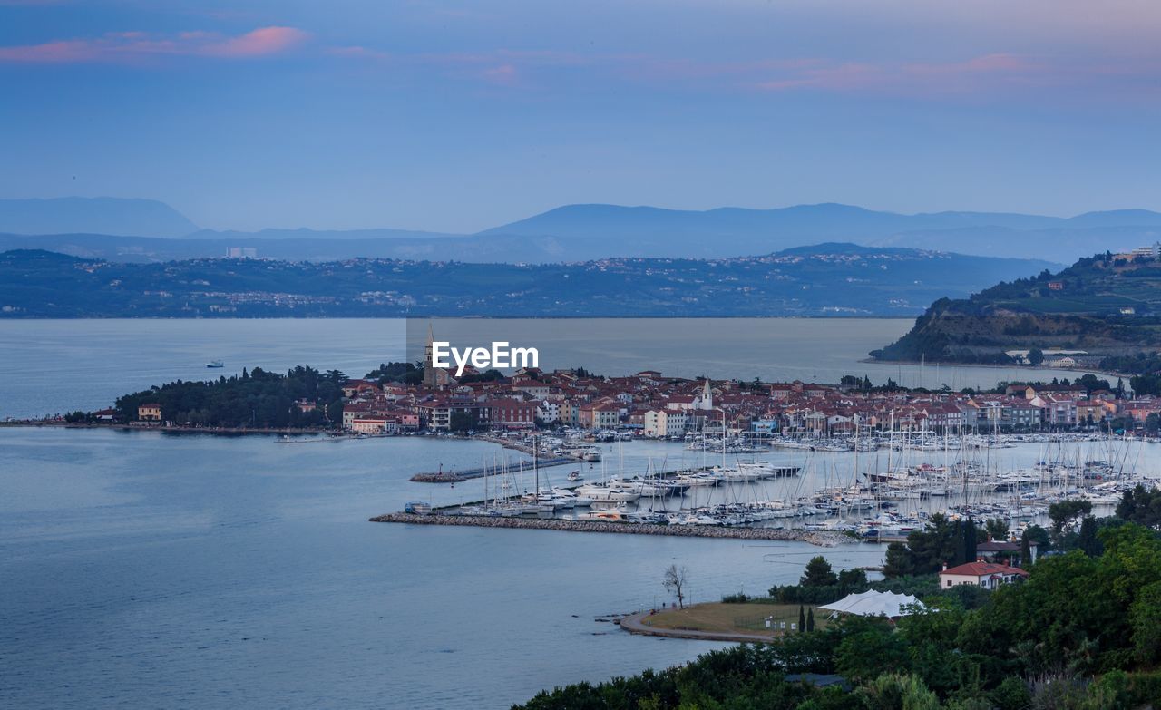 High angle view of town by sea