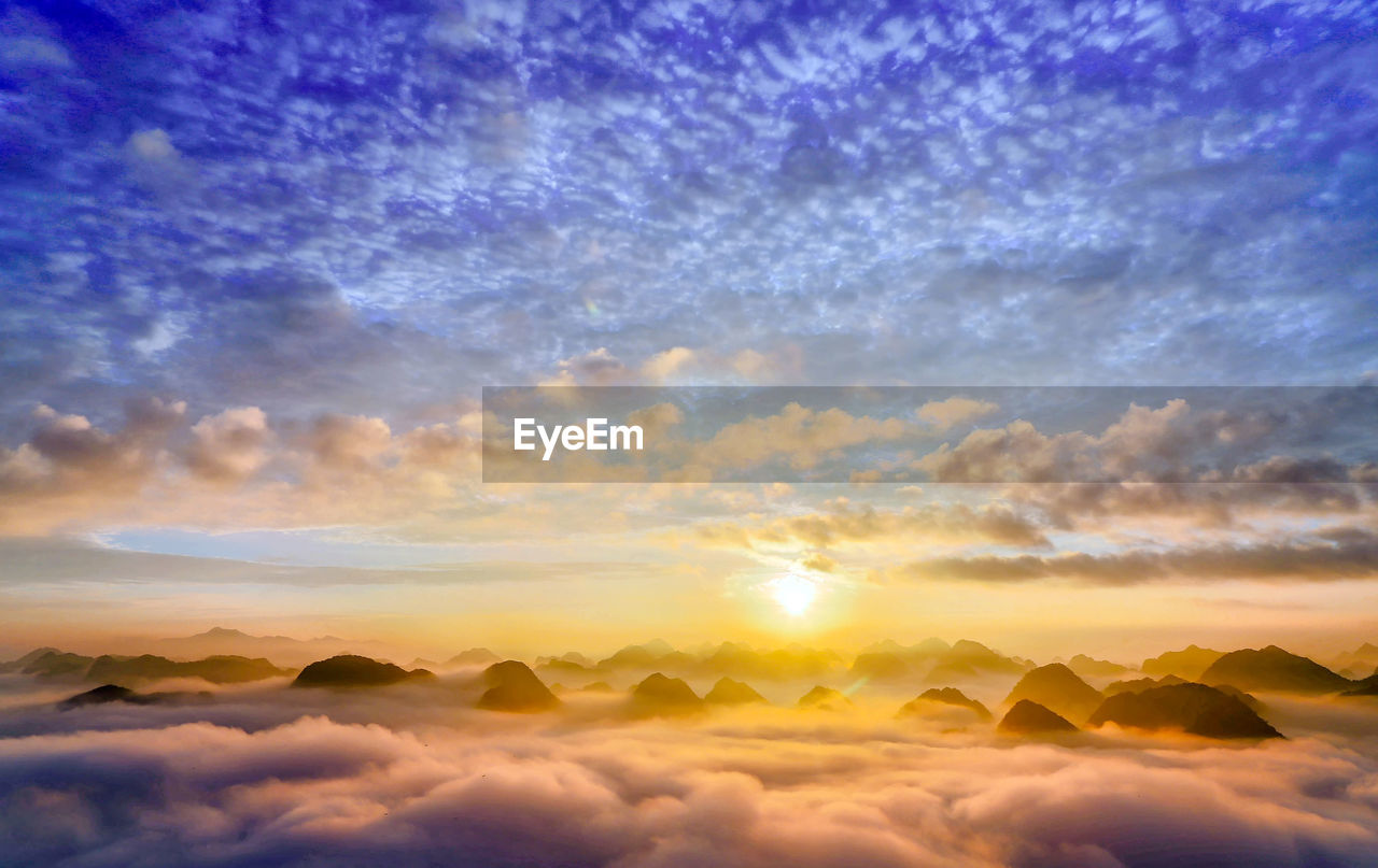 Scenic view of dramatic sky during sunset