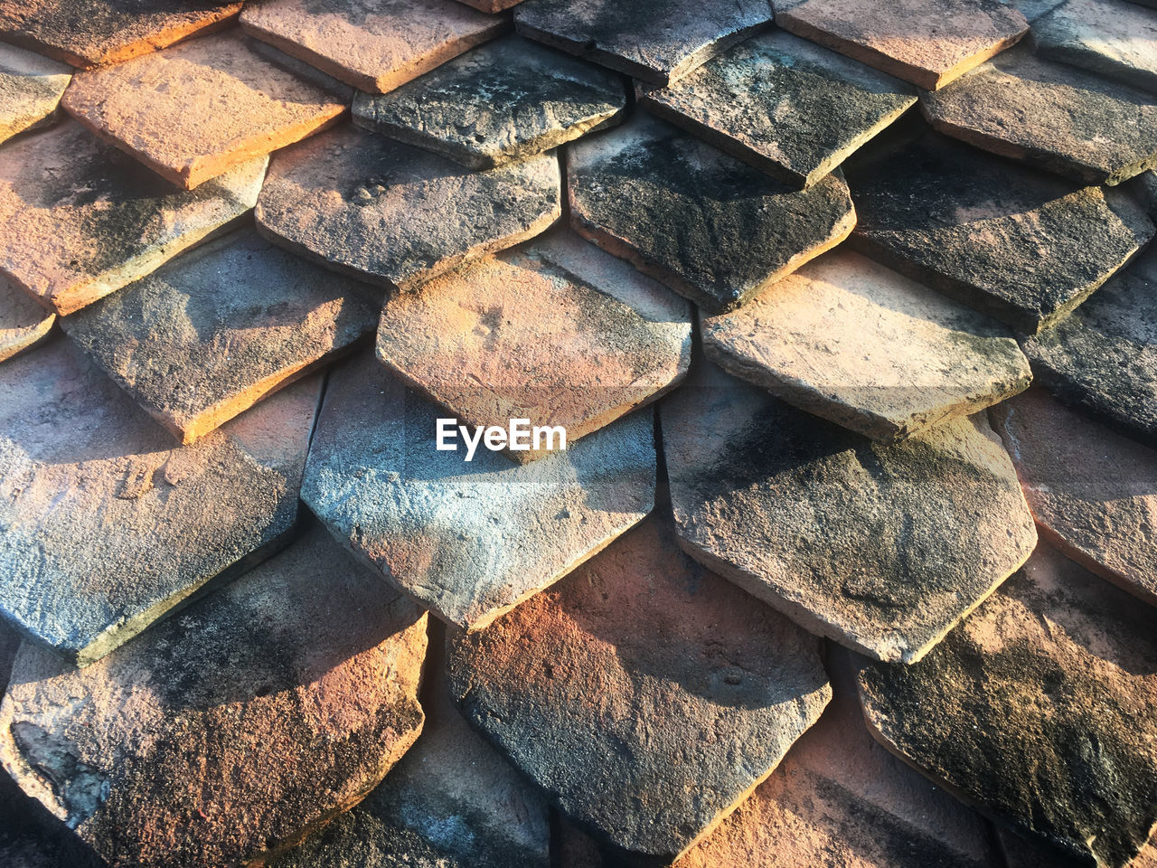 FULL FRAME SHOT OF STACK OF STONES