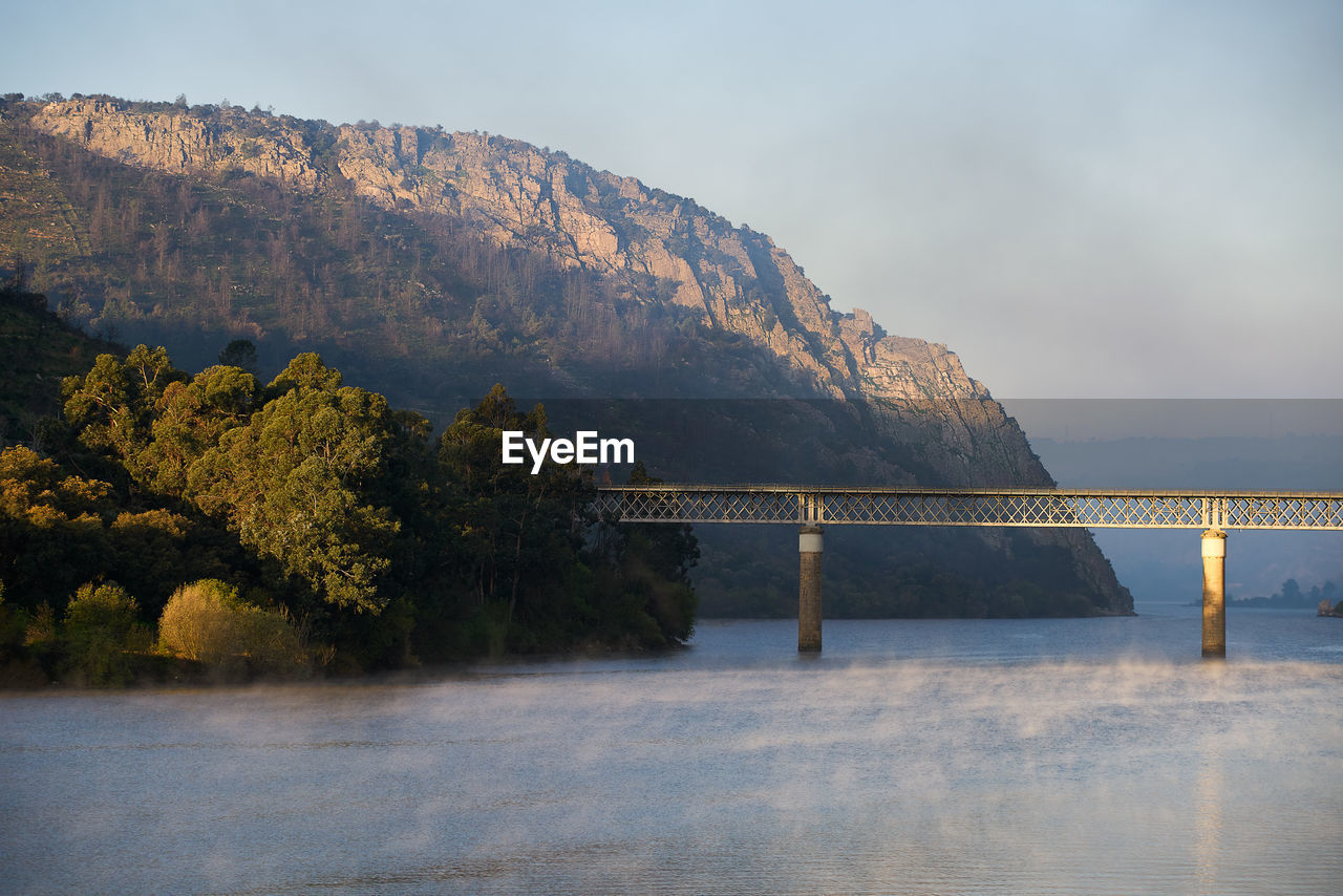 Portas de rodao landscape in vila velha de rodao with a beautiful bridge at sunrise, in portugal