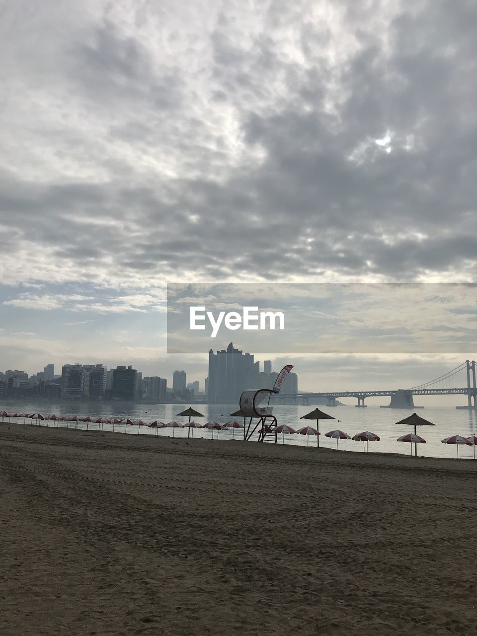 Scenic view of beach against sky during sunset