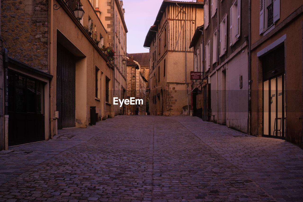 Narrow alley along buildings