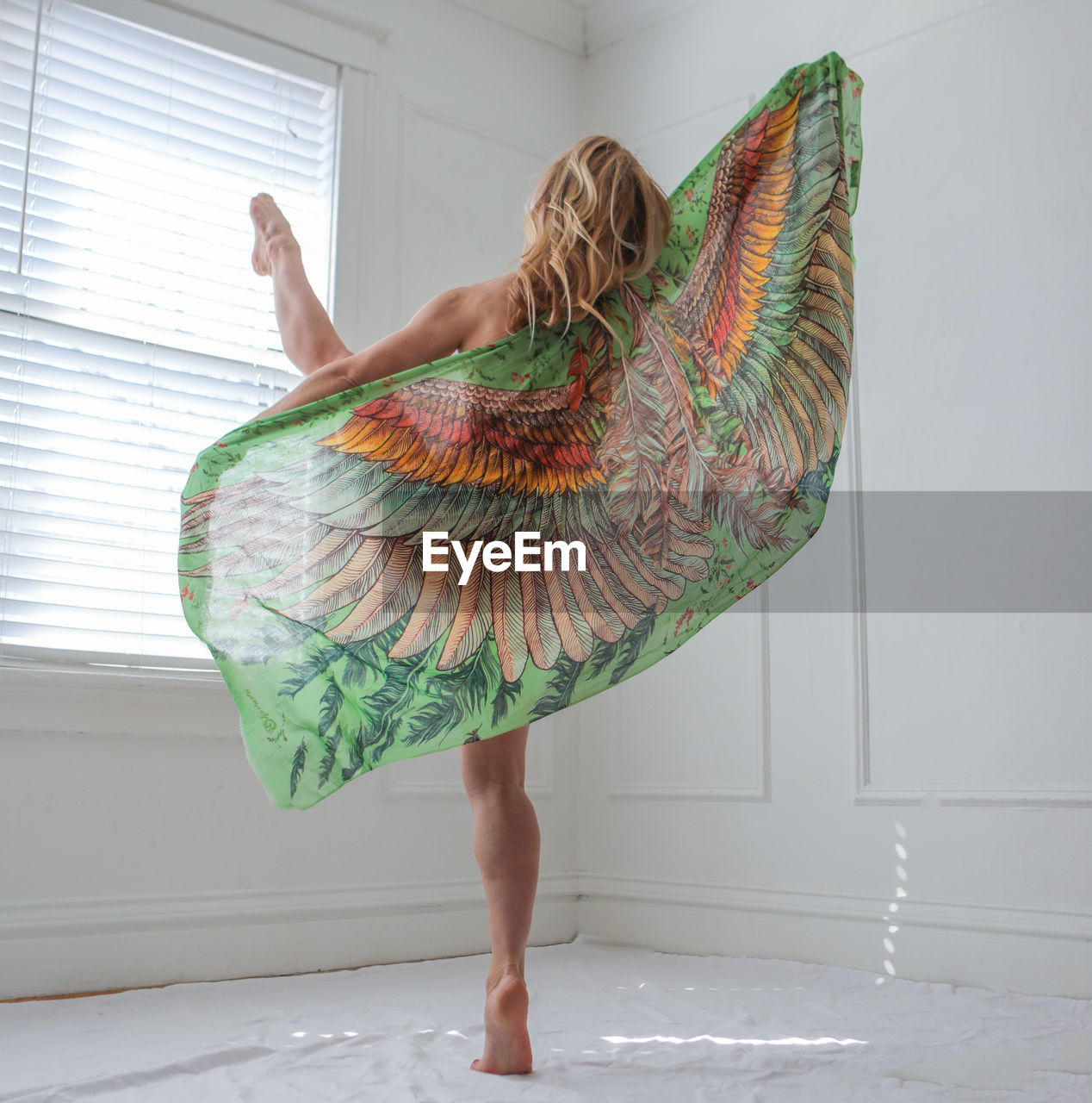 Woman dancing indoors