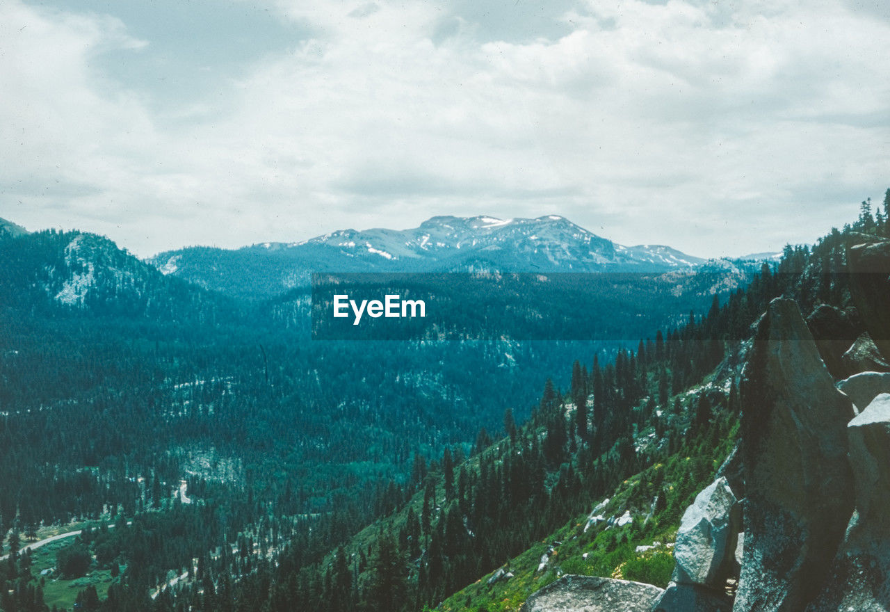 panoramic view of snowcapped mountains against sky