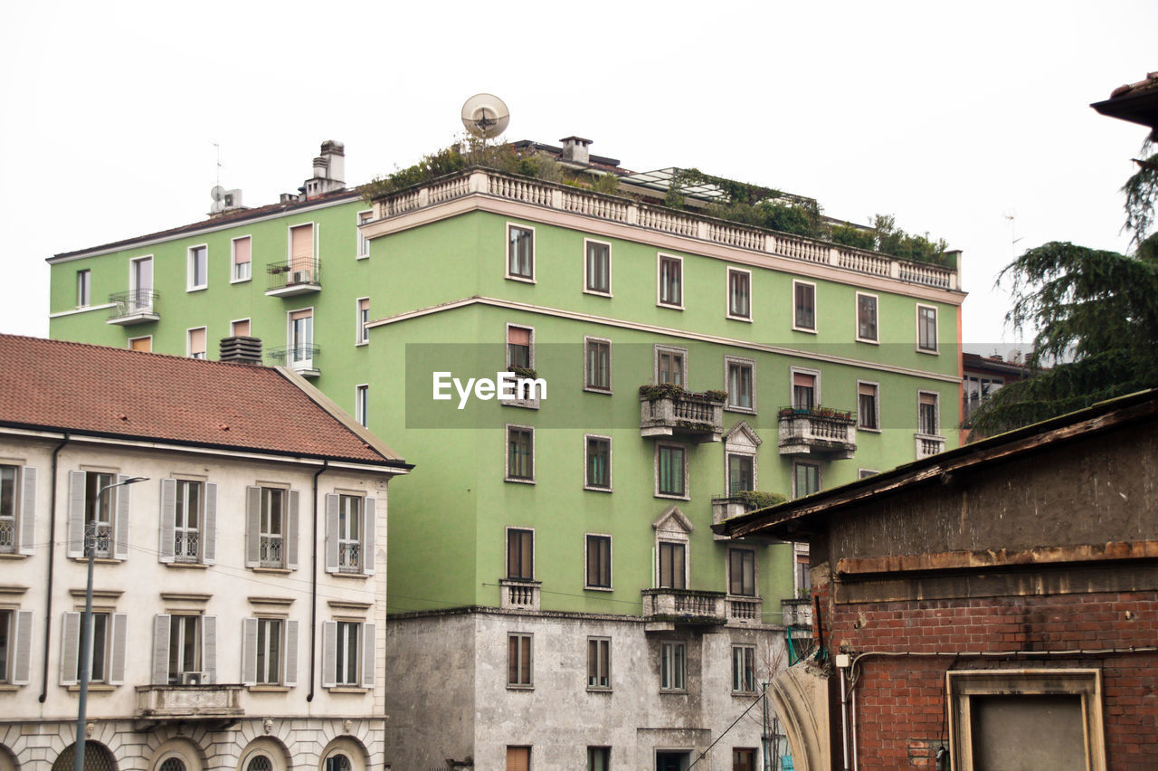 Low angle view of buildings against clear sky