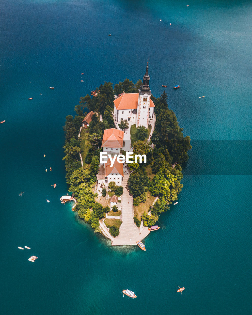 Aerial view of houses amidst sea