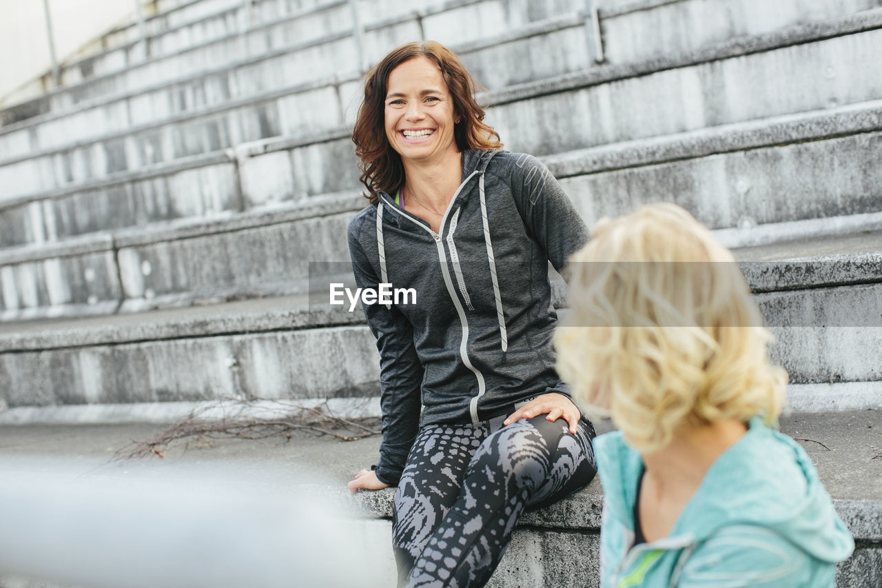 Smiling women on stadium