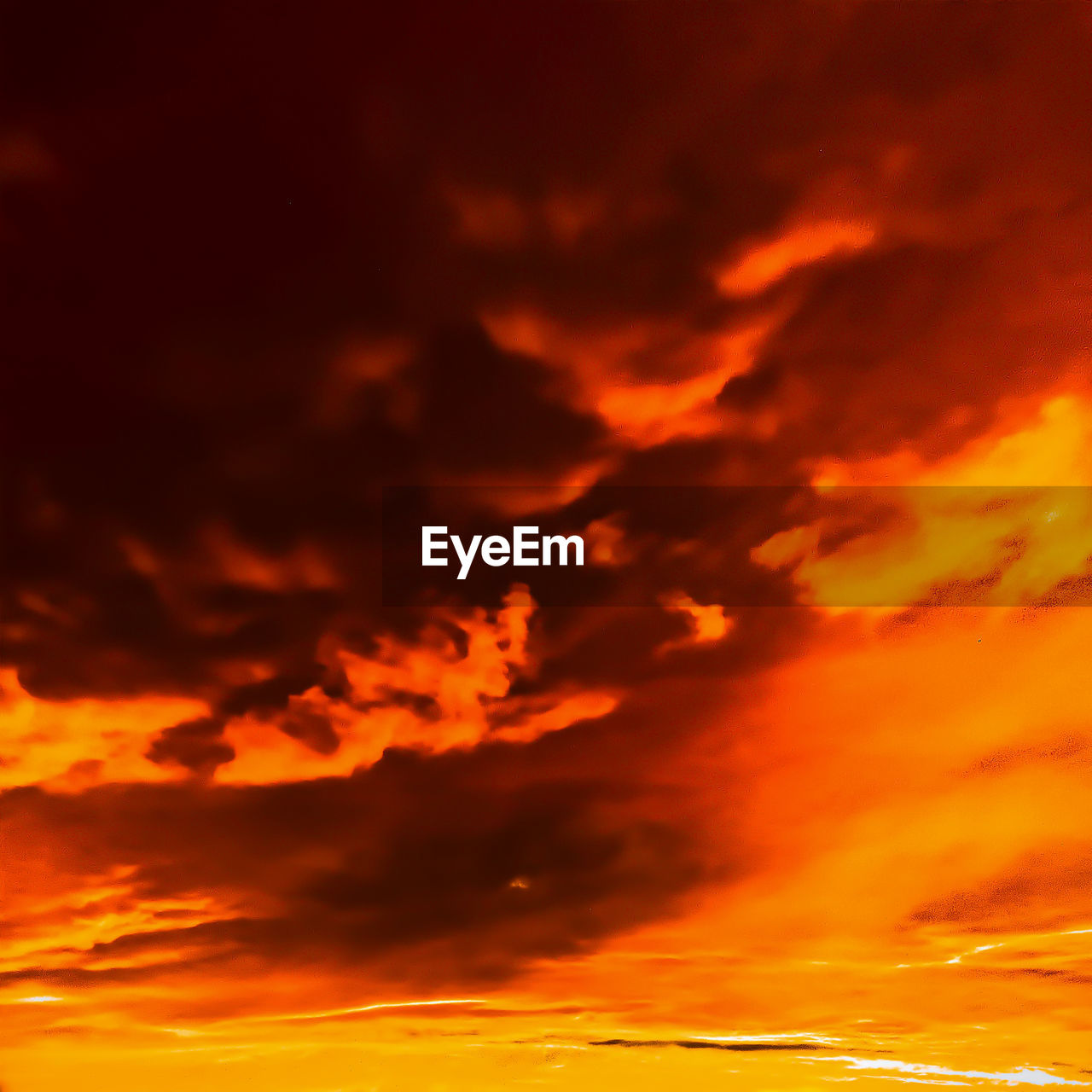 LOW ANGLE VIEW OF ORANGE CLOUDY SKY DURING SUNSET
