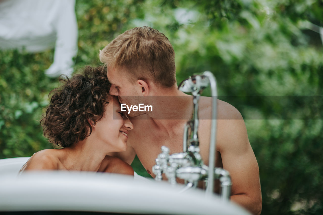 Young couple kissing outdoors