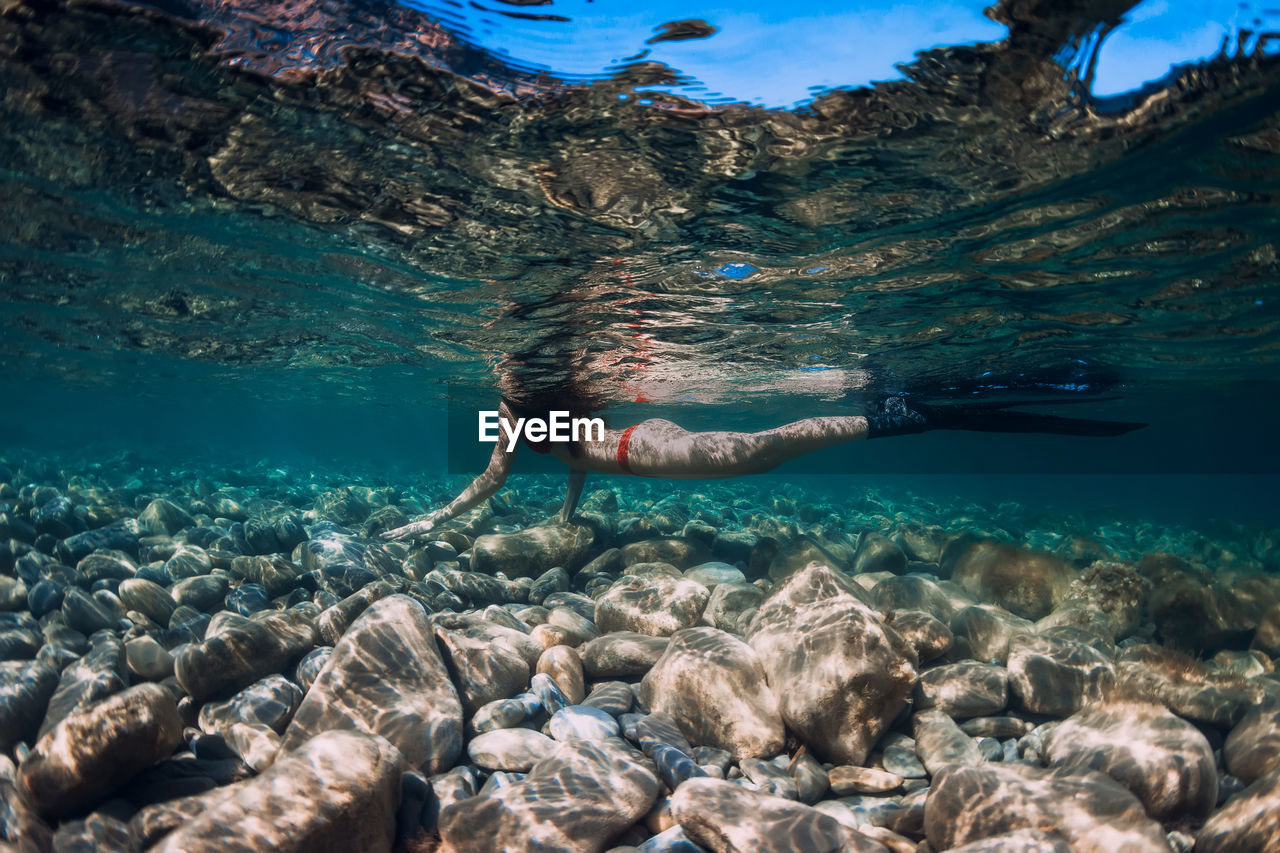 high angle view of swimming in sea