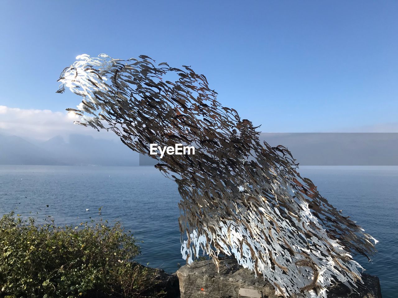 SCENIC VIEW OF SEA AGAINST BLUE SKY