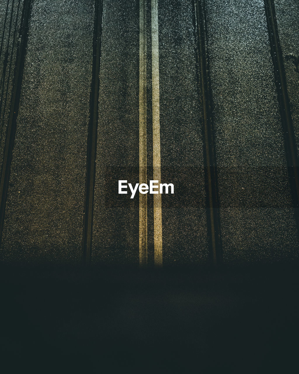 FULL FRAME SHOT OF RAILROAD TRACK AT NIGHT