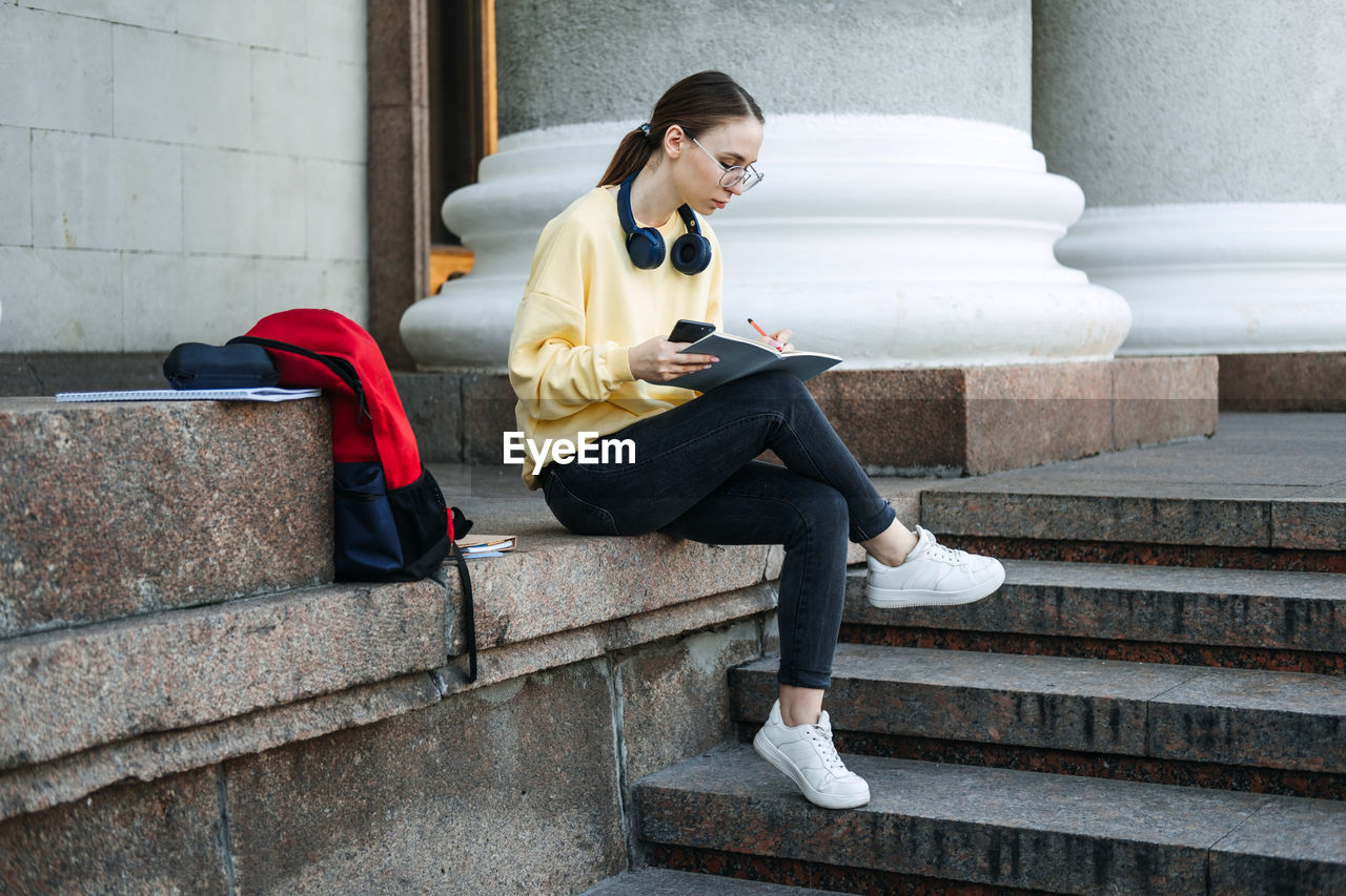 Study tips for back to school, habits of successful students. outdoor portrait of student girl with