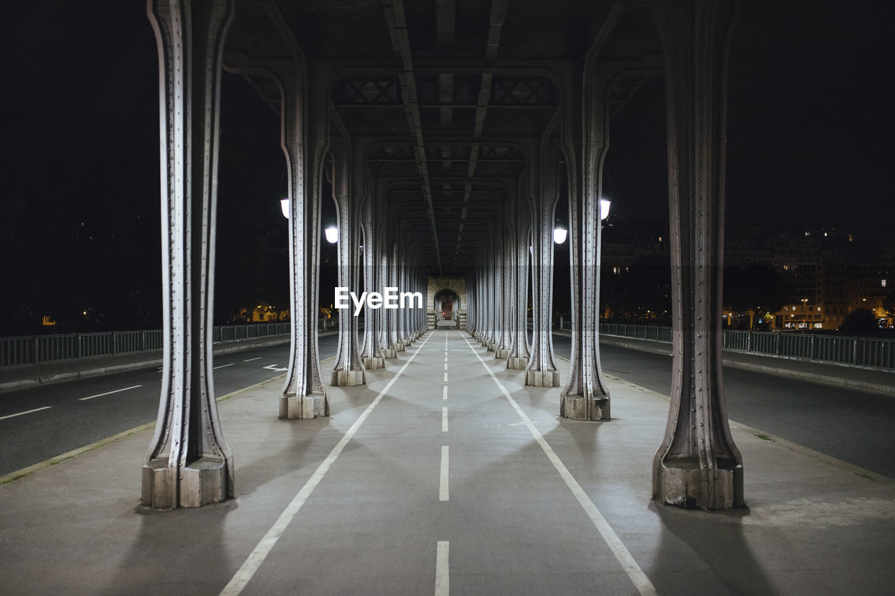 France, ile-de-france, paris, underside of pont de bir-hakeim at night