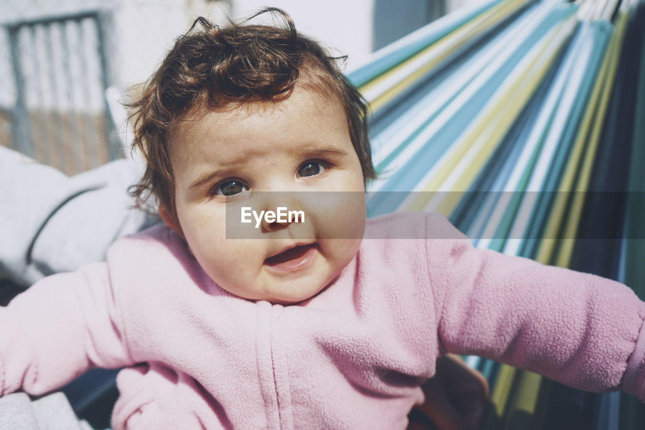 Portrait of cute baby girl at outdoors