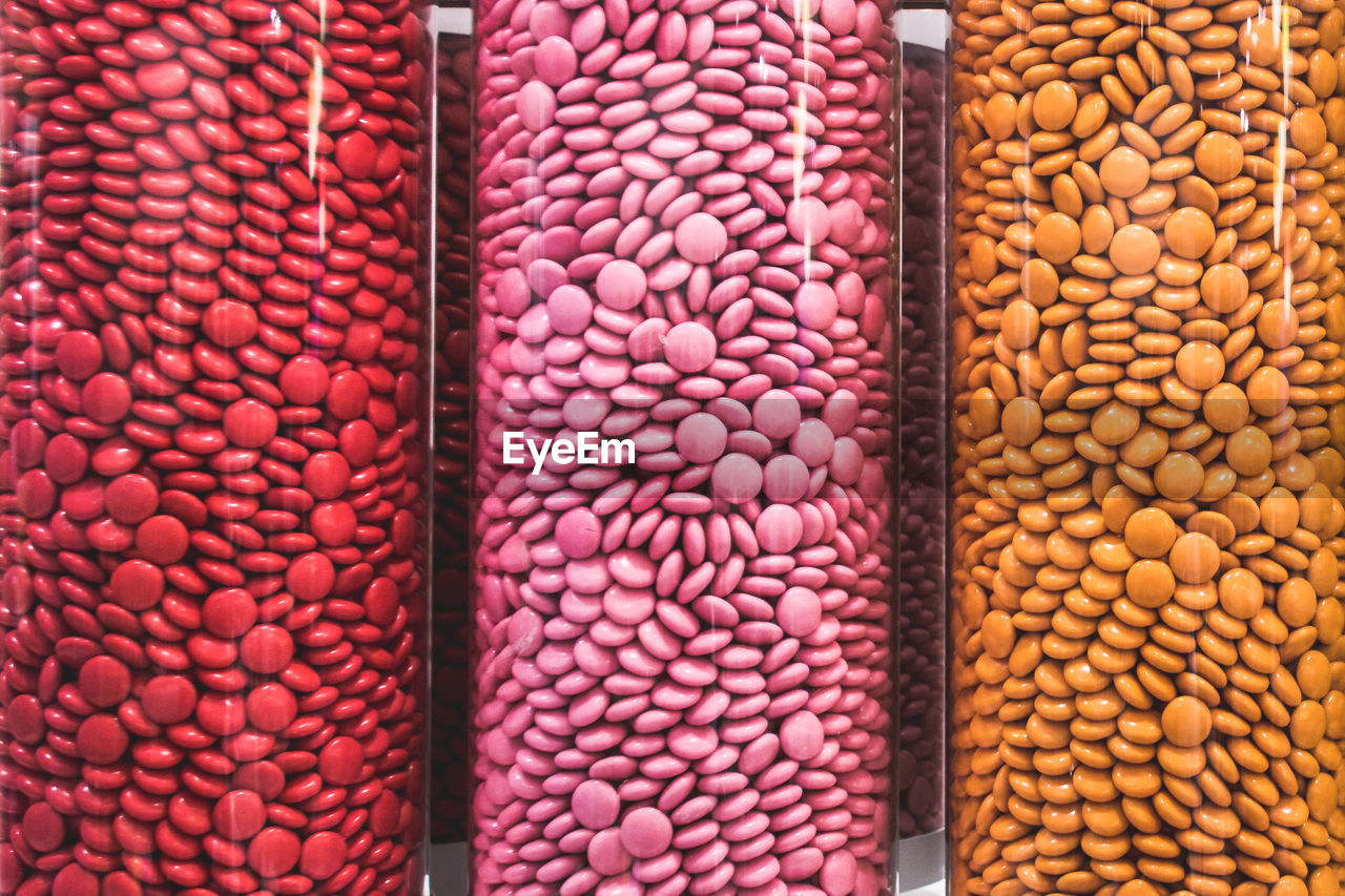 Full frame shot of colorful chocolate in bottle