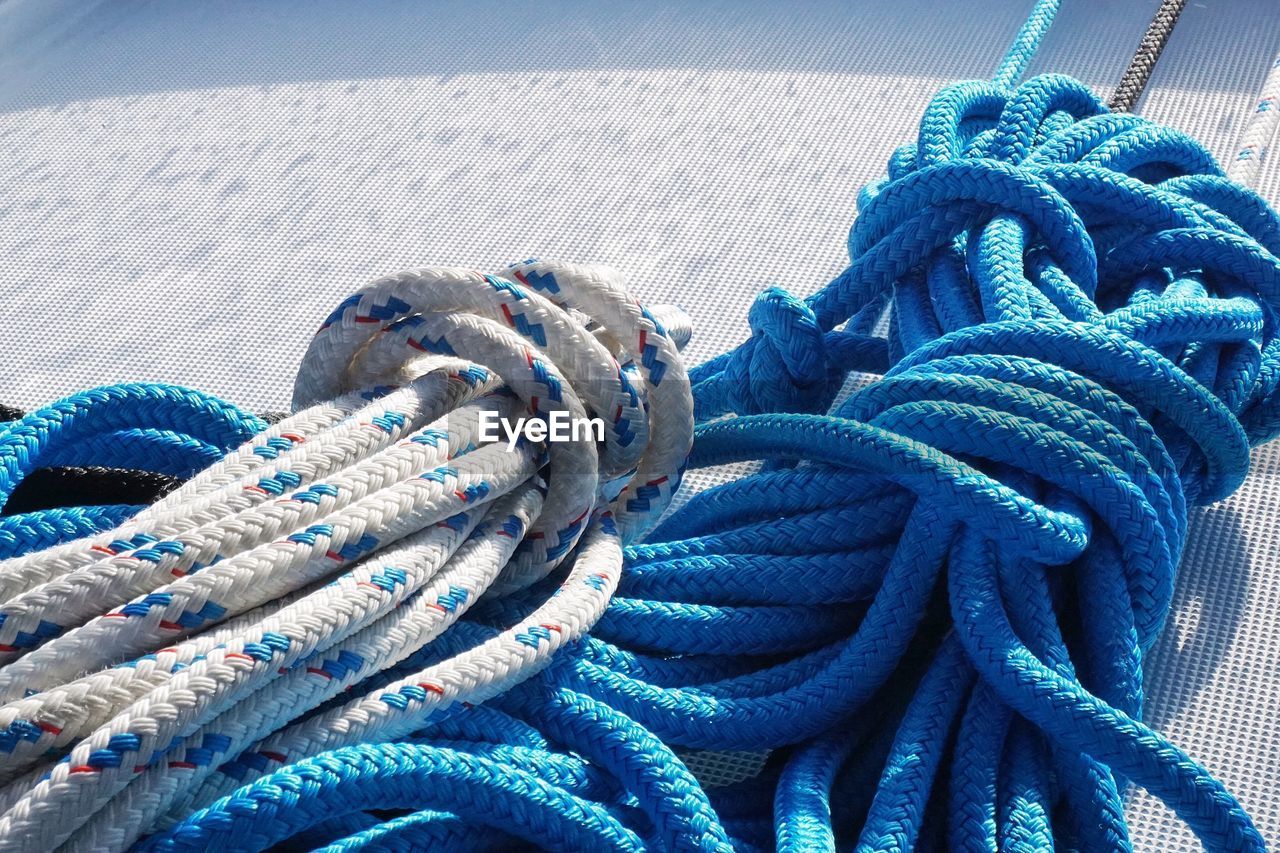 High angle view of tied ropes on boat