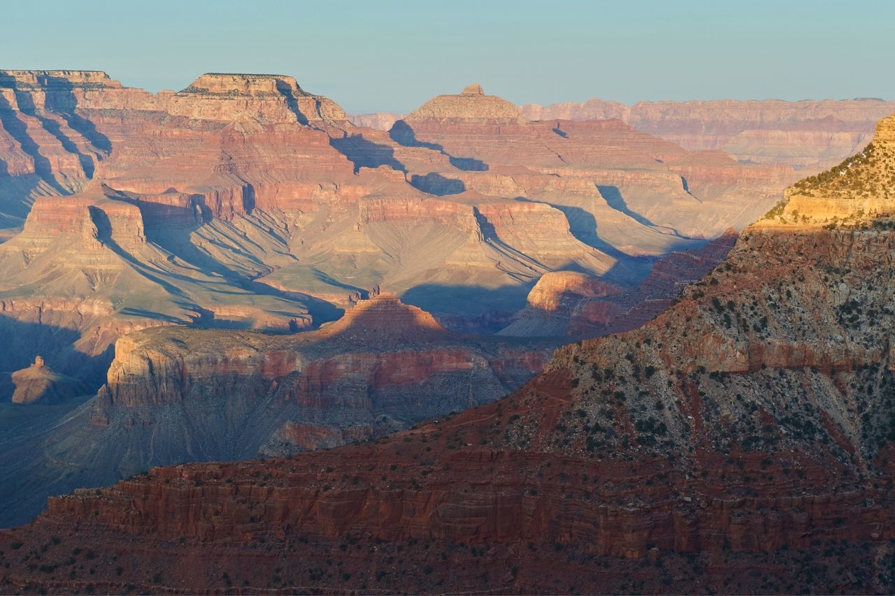 LOW ANGLE VIEW OF ROCK FORMATIONS