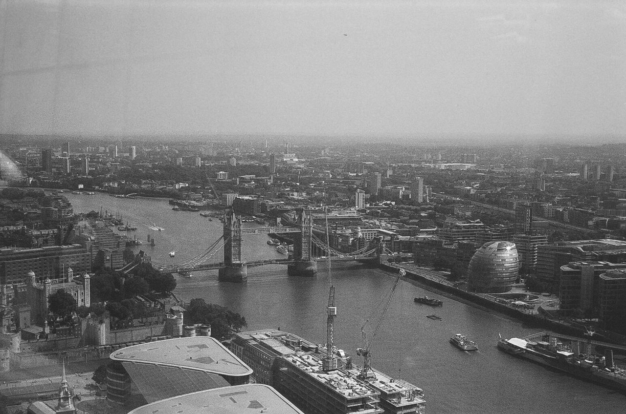 High angle view of city at riverbank