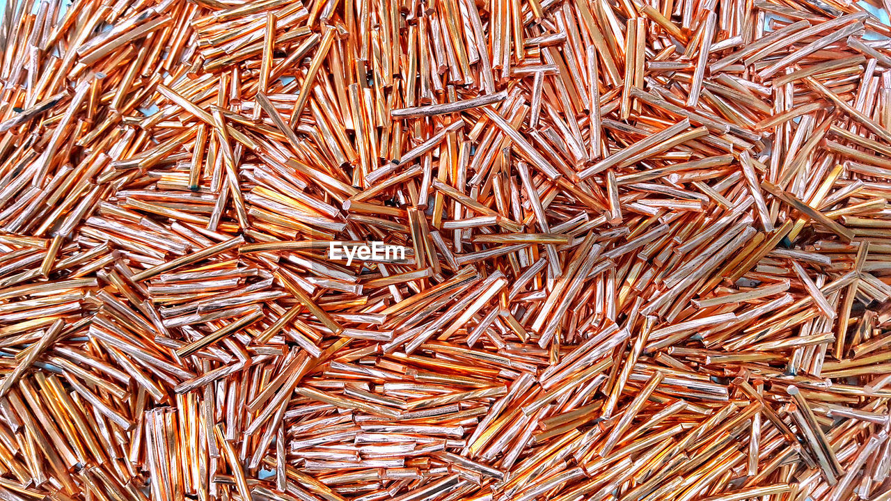 Full frame shot of copper rods