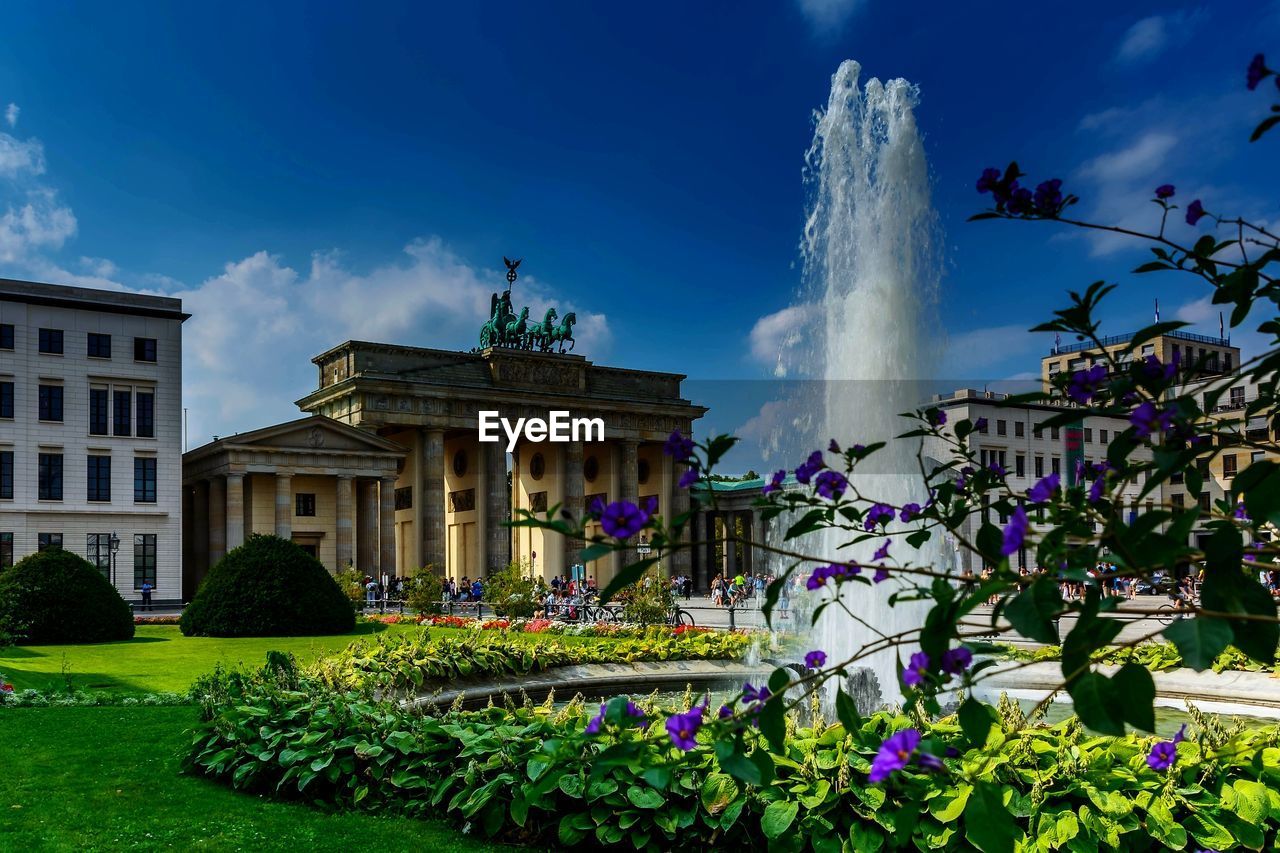 Panoramic view of building against cloudy sky