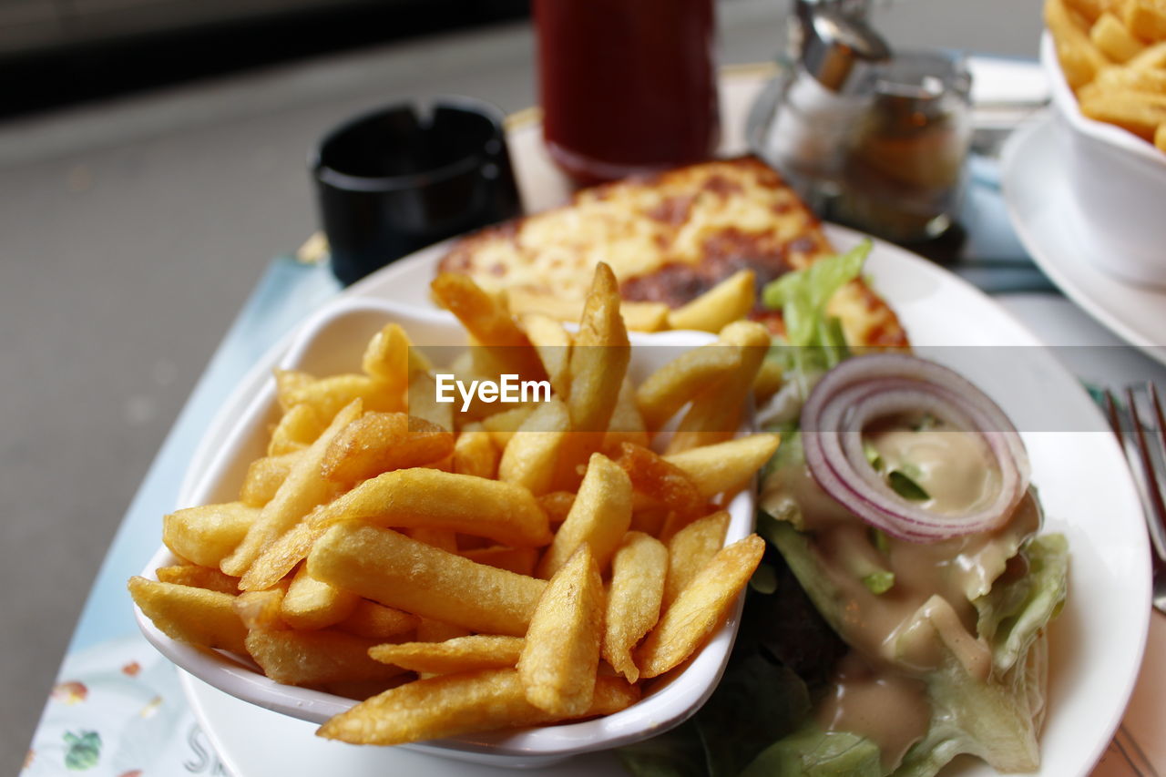 High angle view of french fries in plate on table