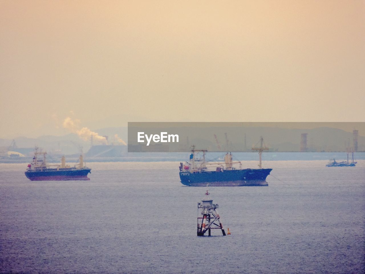 BOATS SAILING IN SEA