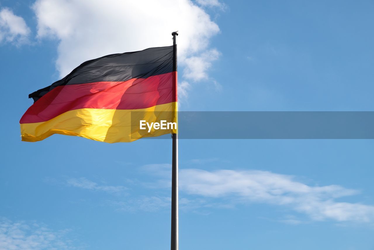 German flag waving against sky